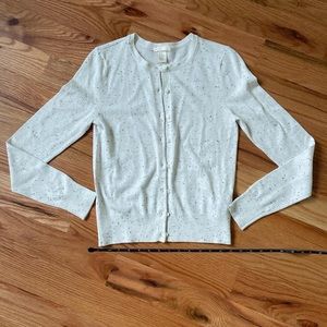 H&M white with black specks button up cardigan. Size XS